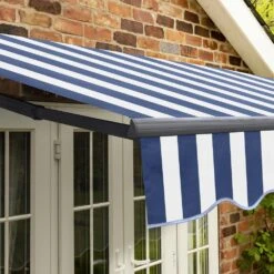 2.5m Standard Manual Blue And White Awning (Charcoal Cassette) -Primrose awn standard charcoal bluewhitestripe 6