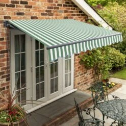 2.5m Standard Manual Green And White Awning (Charcoal Cassette)